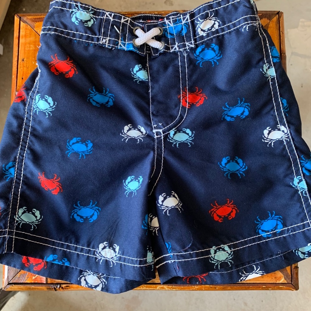 CARTER’S crab swim trunks